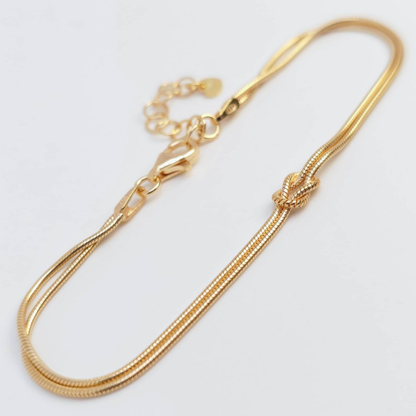 Goldarmband Knoten 18K Gold Unendlichkeit Achtknoten Schlangenarmband rund zart