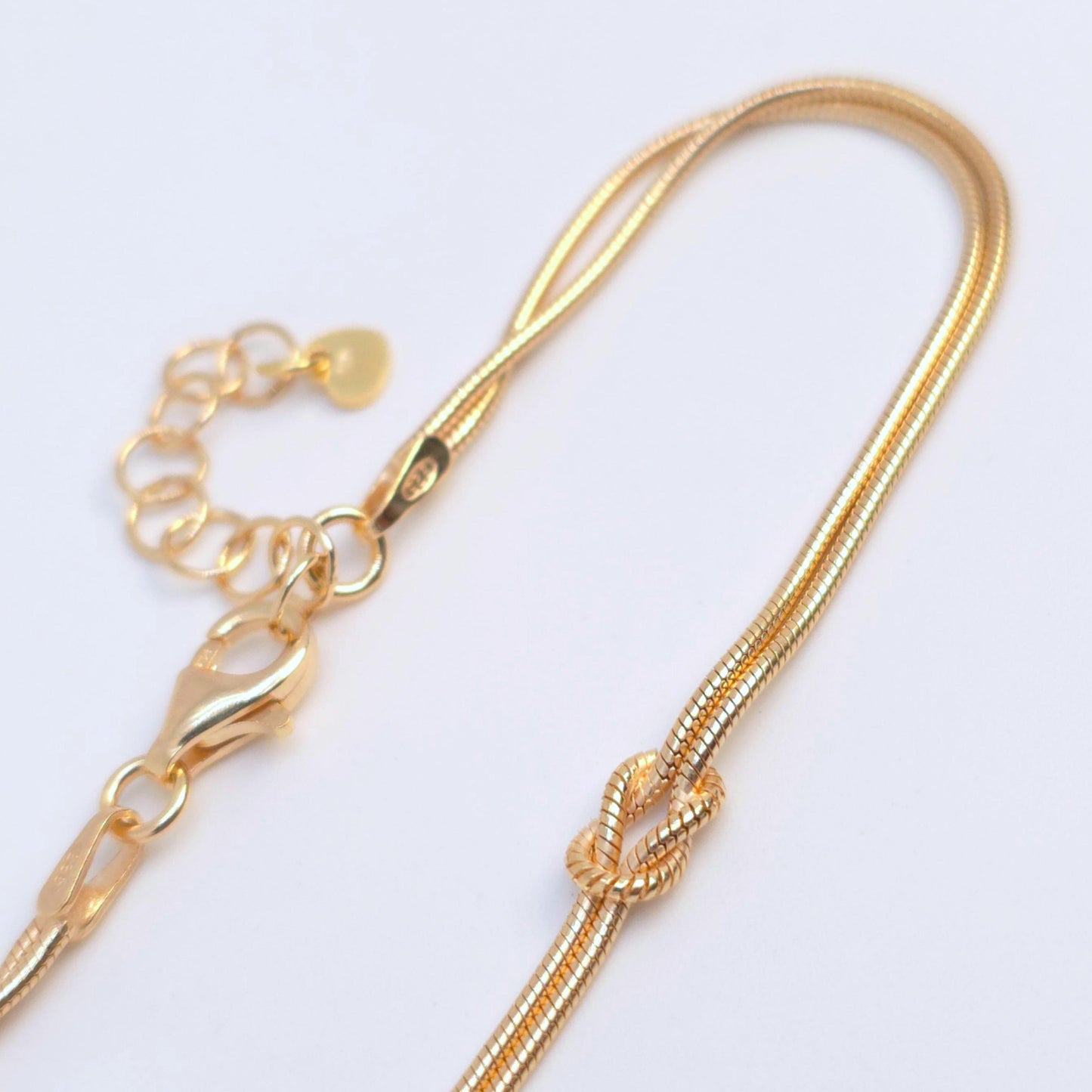 Goldarmband Knoten 18K Gold Unendlichkeit Achtknoten Schlangenarmband rund zart