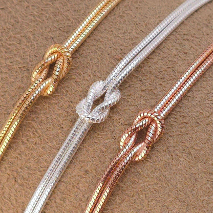 Goldarmband Knoten 18K Gold Unendlichkeit Achtknoten Schlangenarmband rund zart
