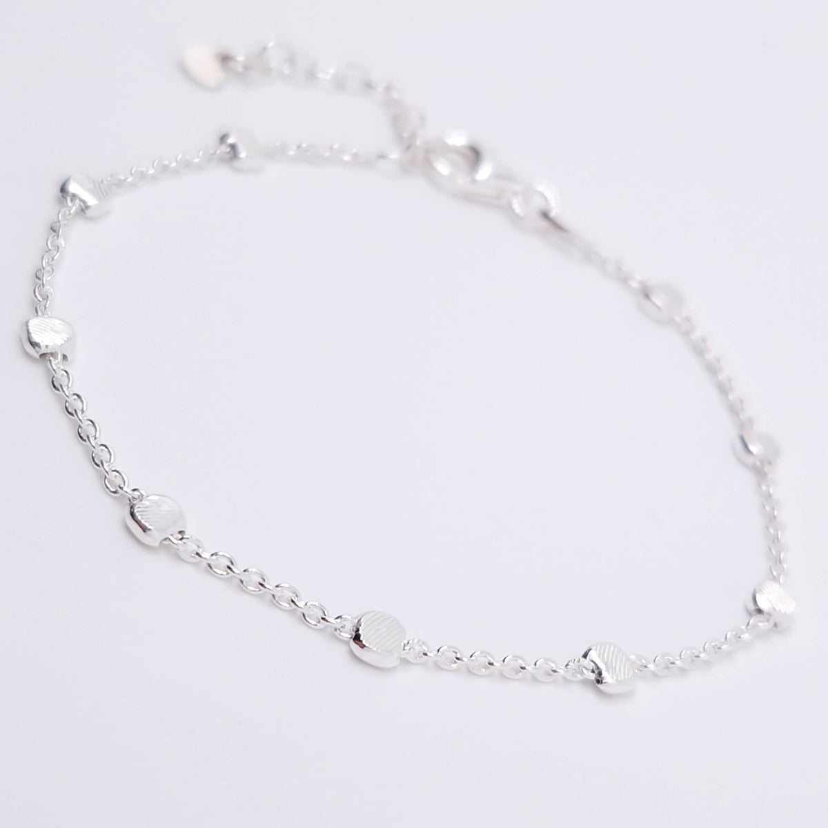 Armband flache Silberperlen 925 Silber strukturiert Muster